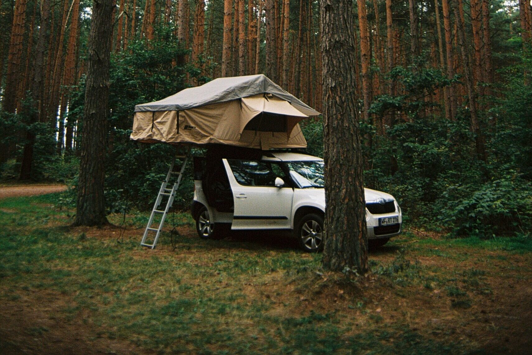 Essential camper van gear on a picnic table